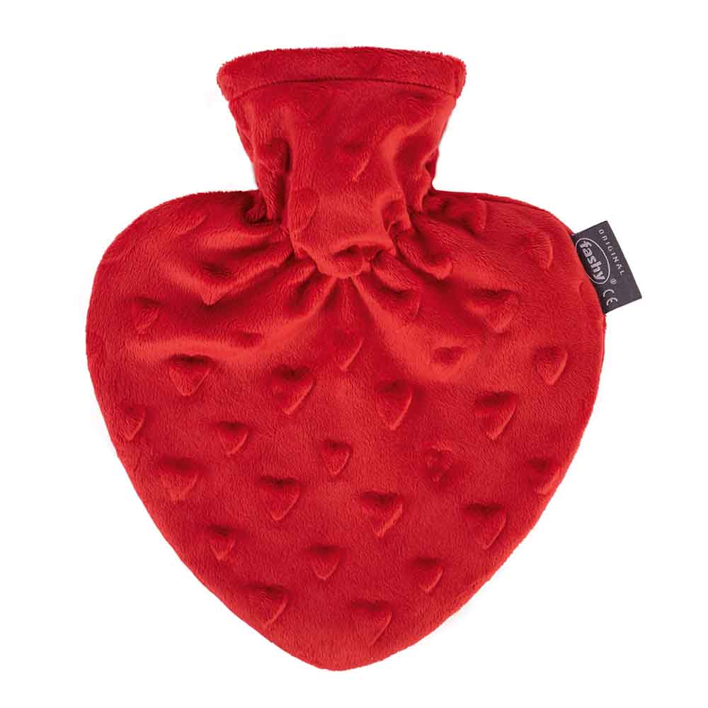 Värmeflaska i formen av ett hjärta i röd nyans
