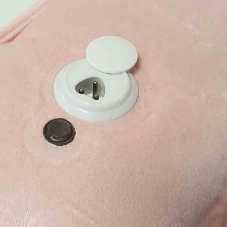 Elektrisk värmeflaska i rosa nyans